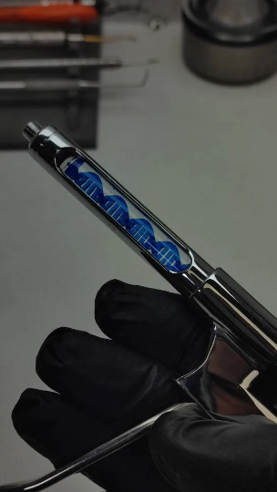 Pistola inyector con dos capsulas intercambiables