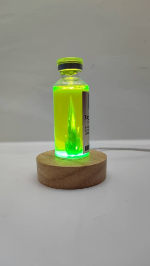 Plataforma para vial con luz Led.( VIAL NO INCLUIDO)